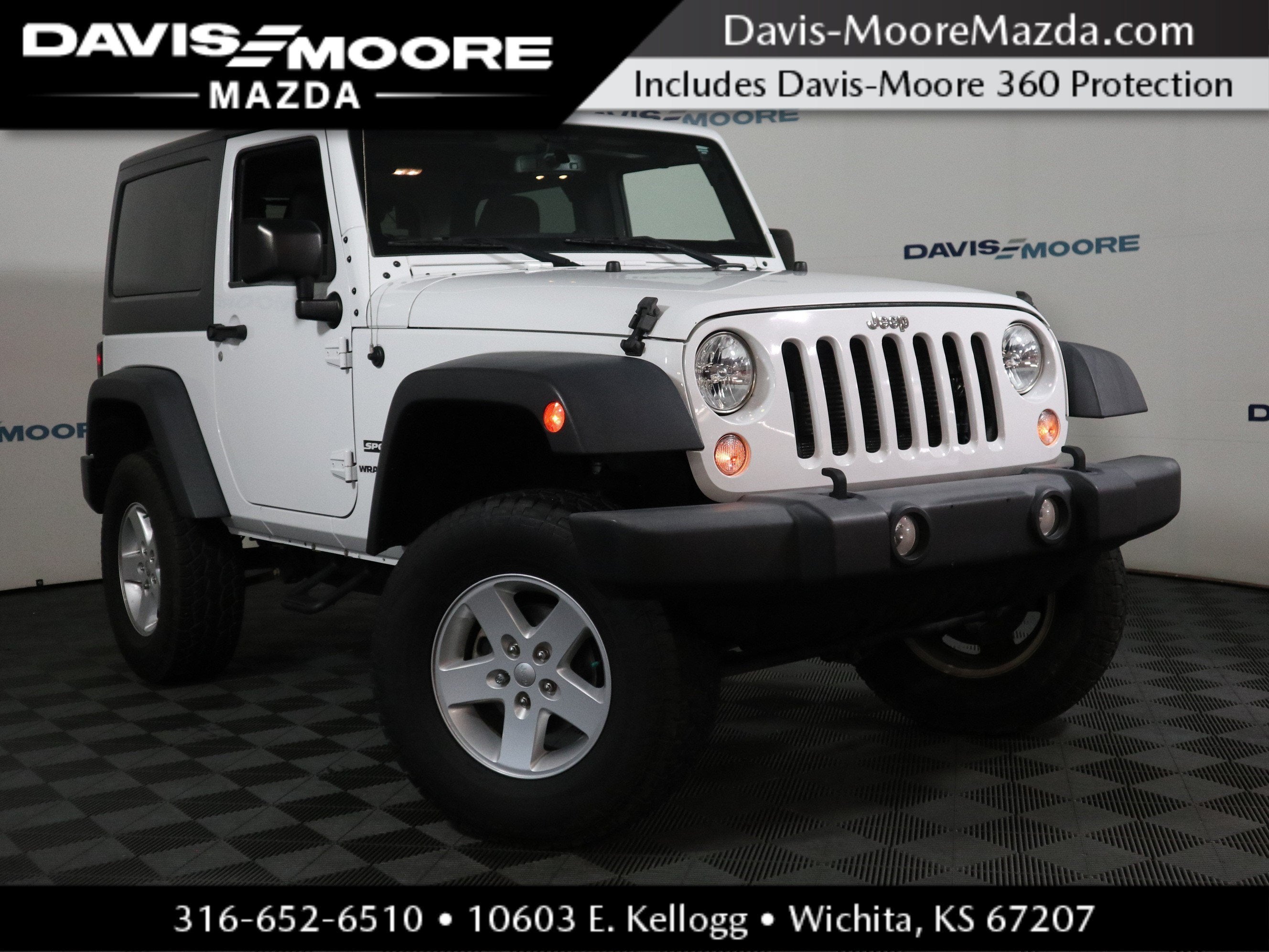 2017 Jeep Wrangler Sport in Bright White Clearcoat — front three-quarter view