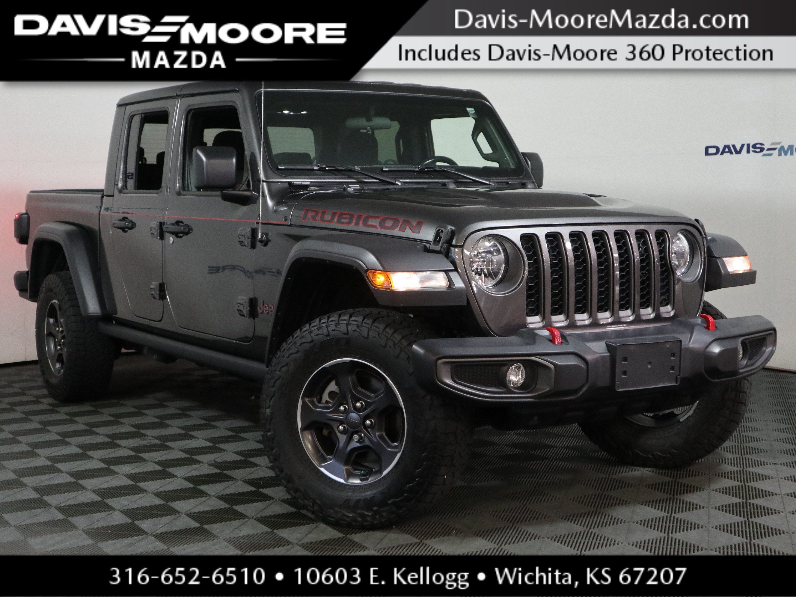 2021 Jeep Gladiator Rubicon in Granite Crystal Metallic Clearcoat — front three-quarter view