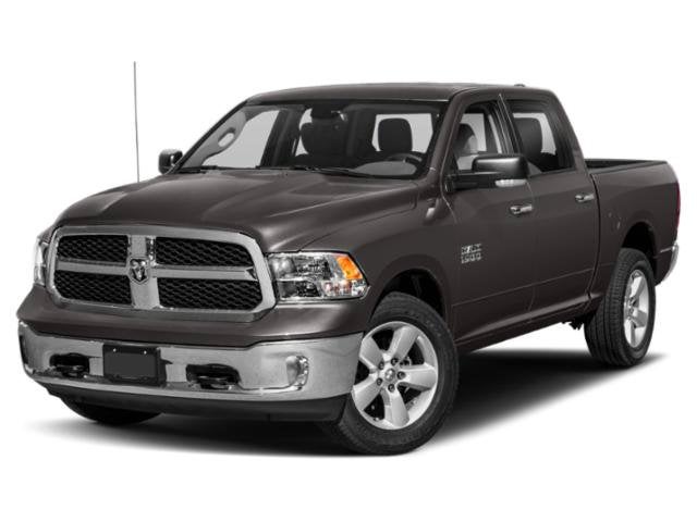 2020 RAM 1500 Classic Warlock in Diamond Black Crystal Pearlcoat — front three-quarter view