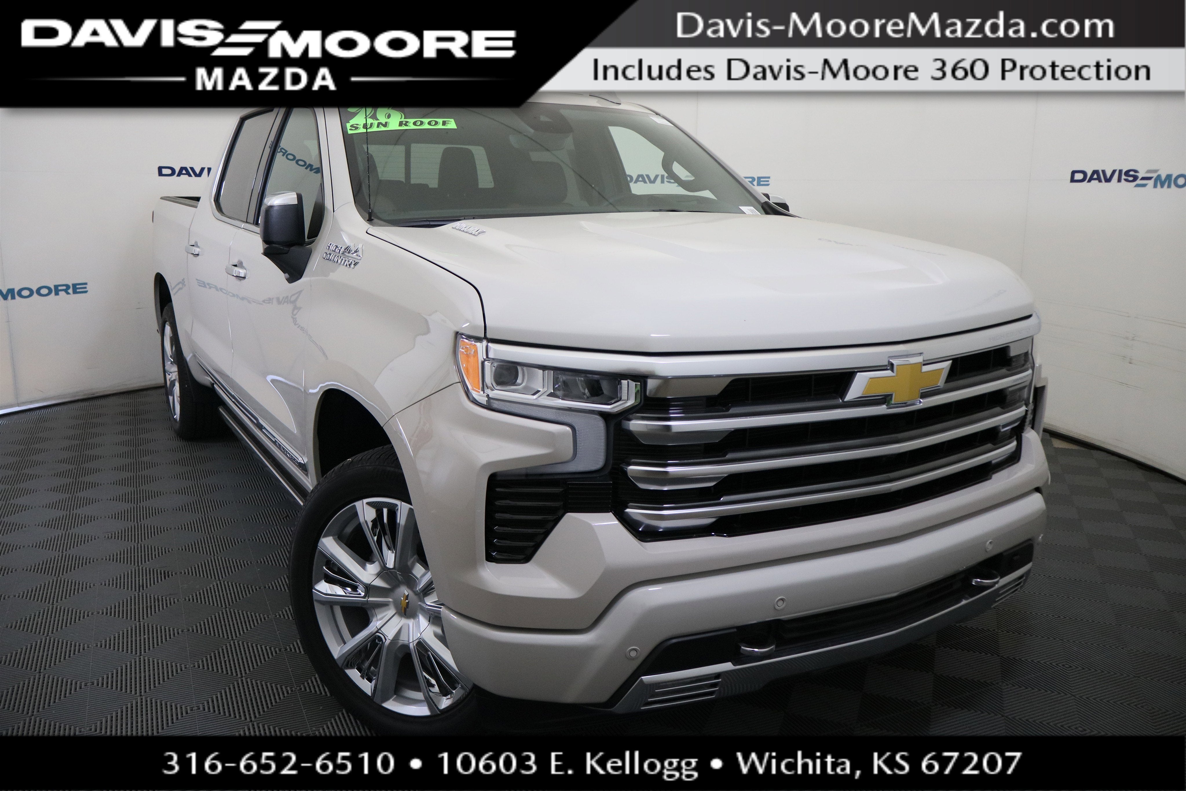 2026 Chevrolet Silverado 1500 High Country in White Sands — front three-quarter view