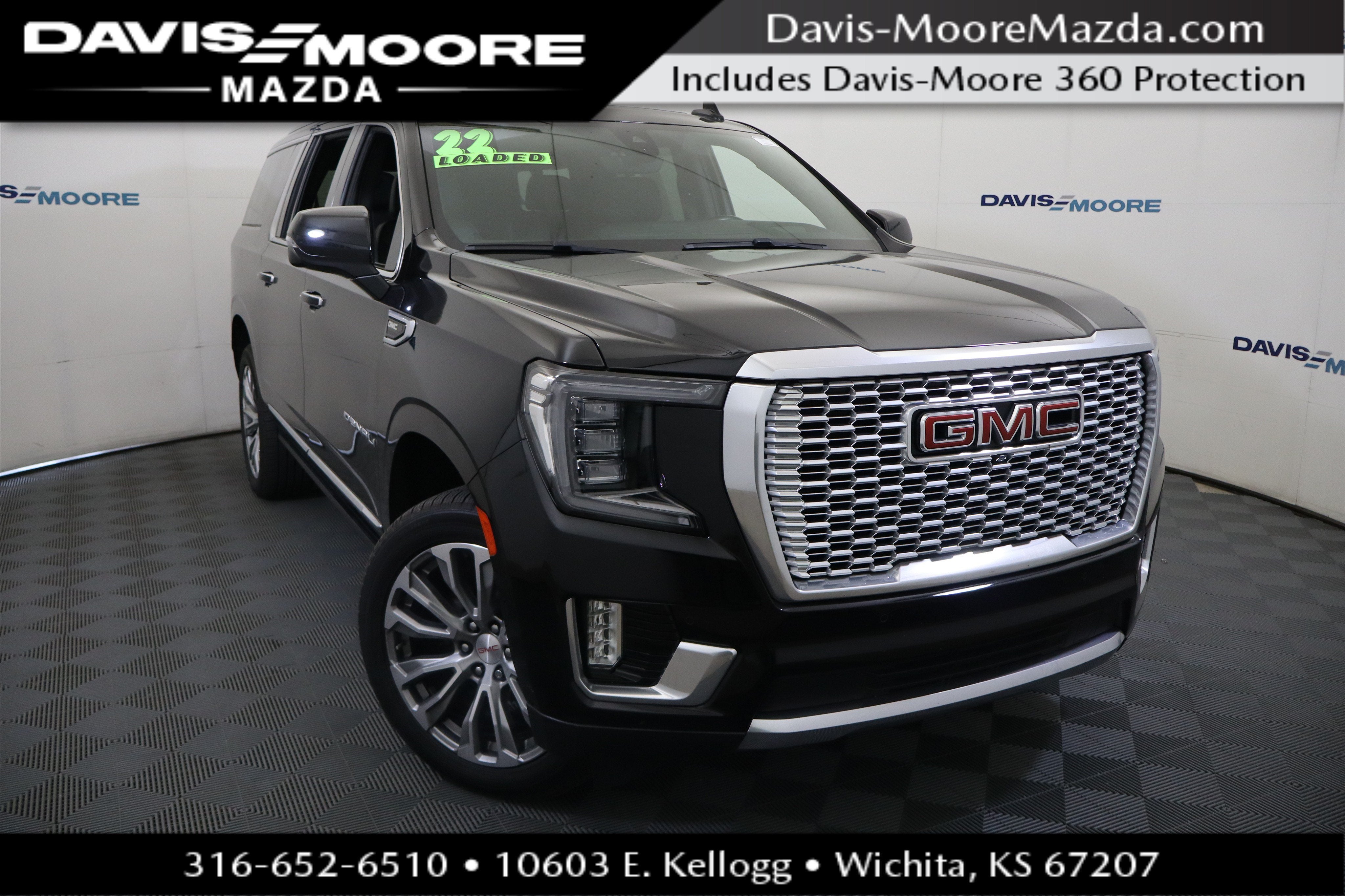 2022 GMC Yukon XL Denali in Onyx Black — front three-quarter view