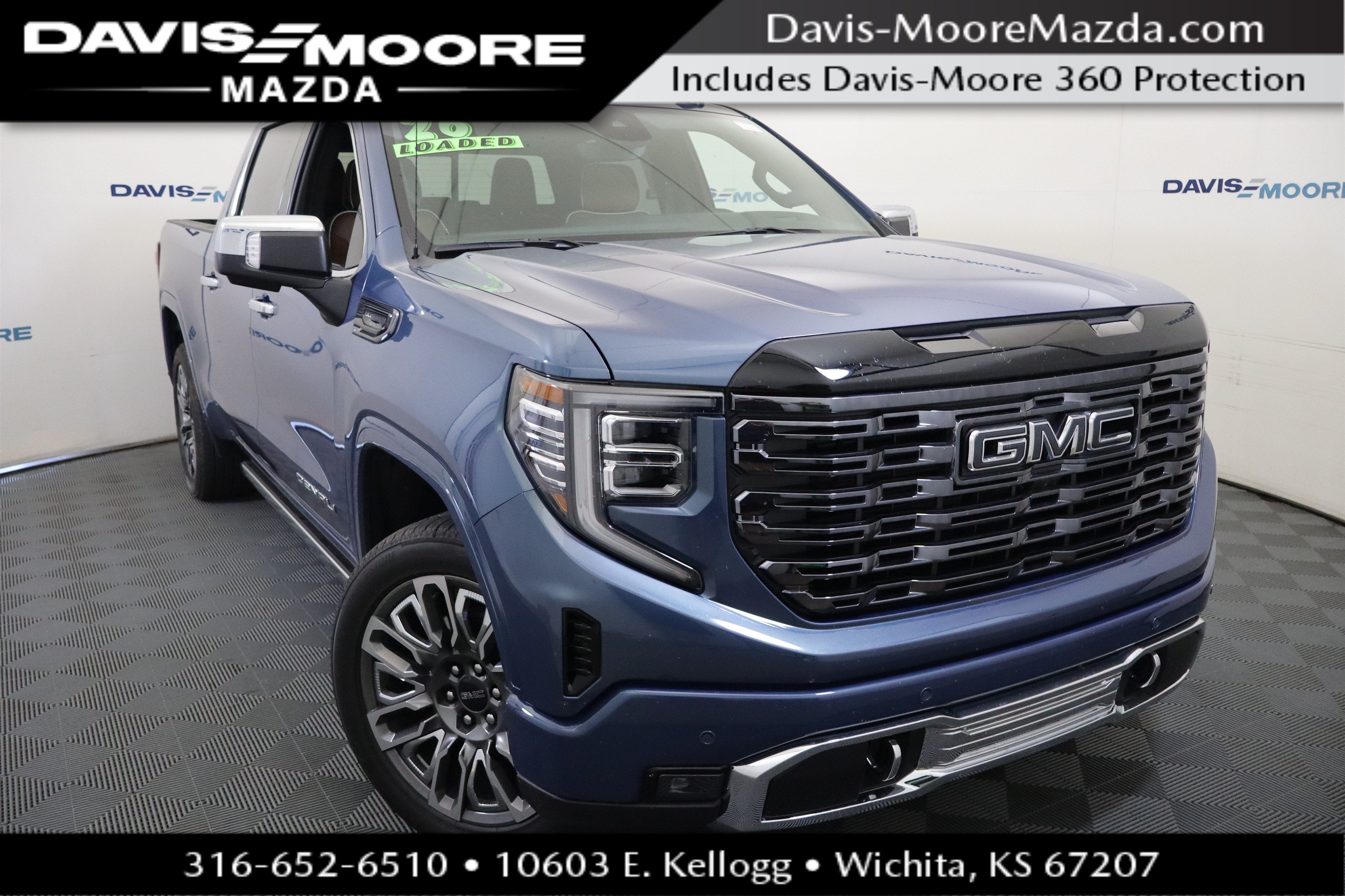 2026 GMC Sierra 1500 Denali Ultimate in Downpour Metallic — front three-quarter view