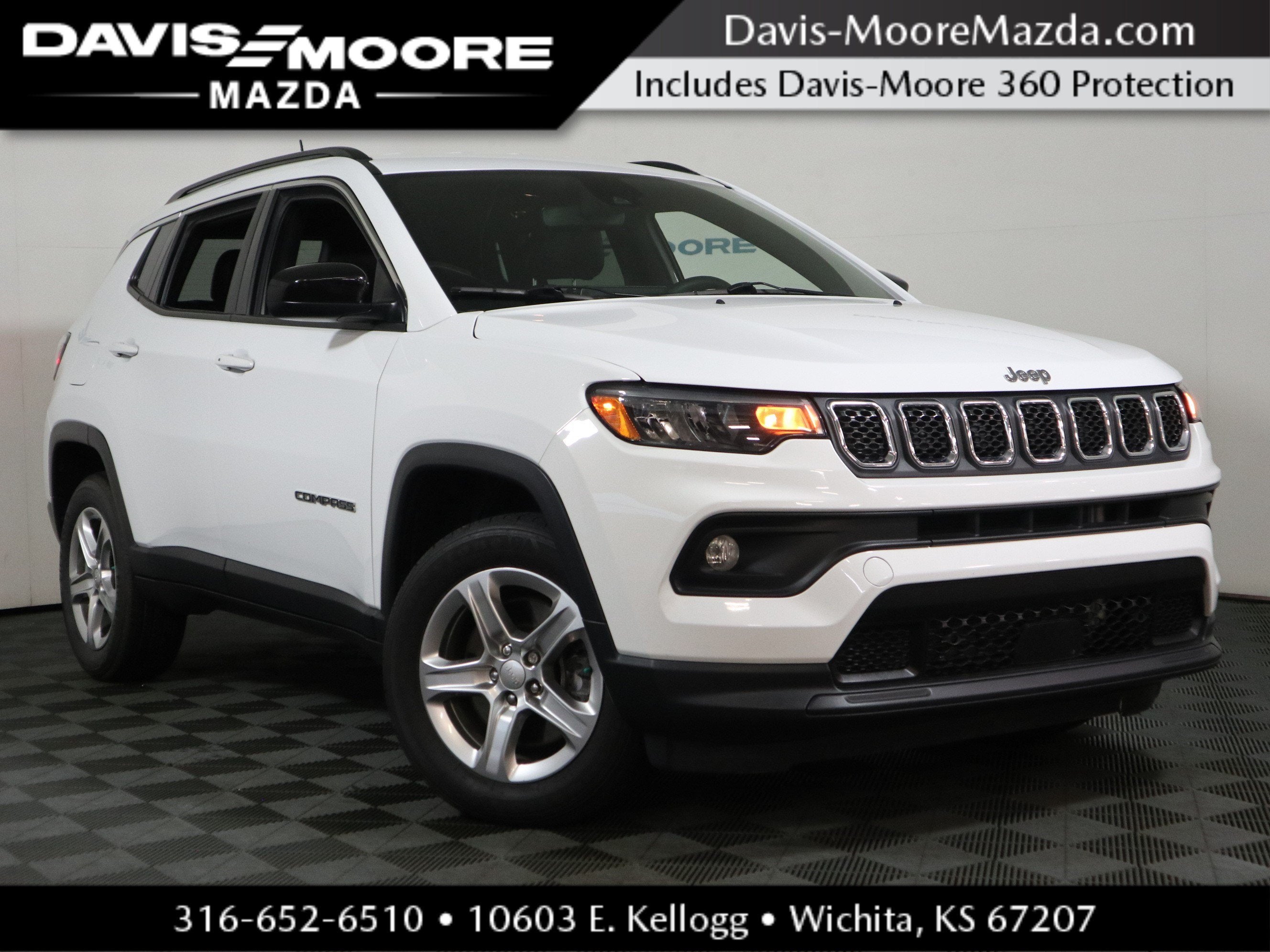 2023 Jeep Compass Latitude in Bright White Clearcoat — front three-quarter view