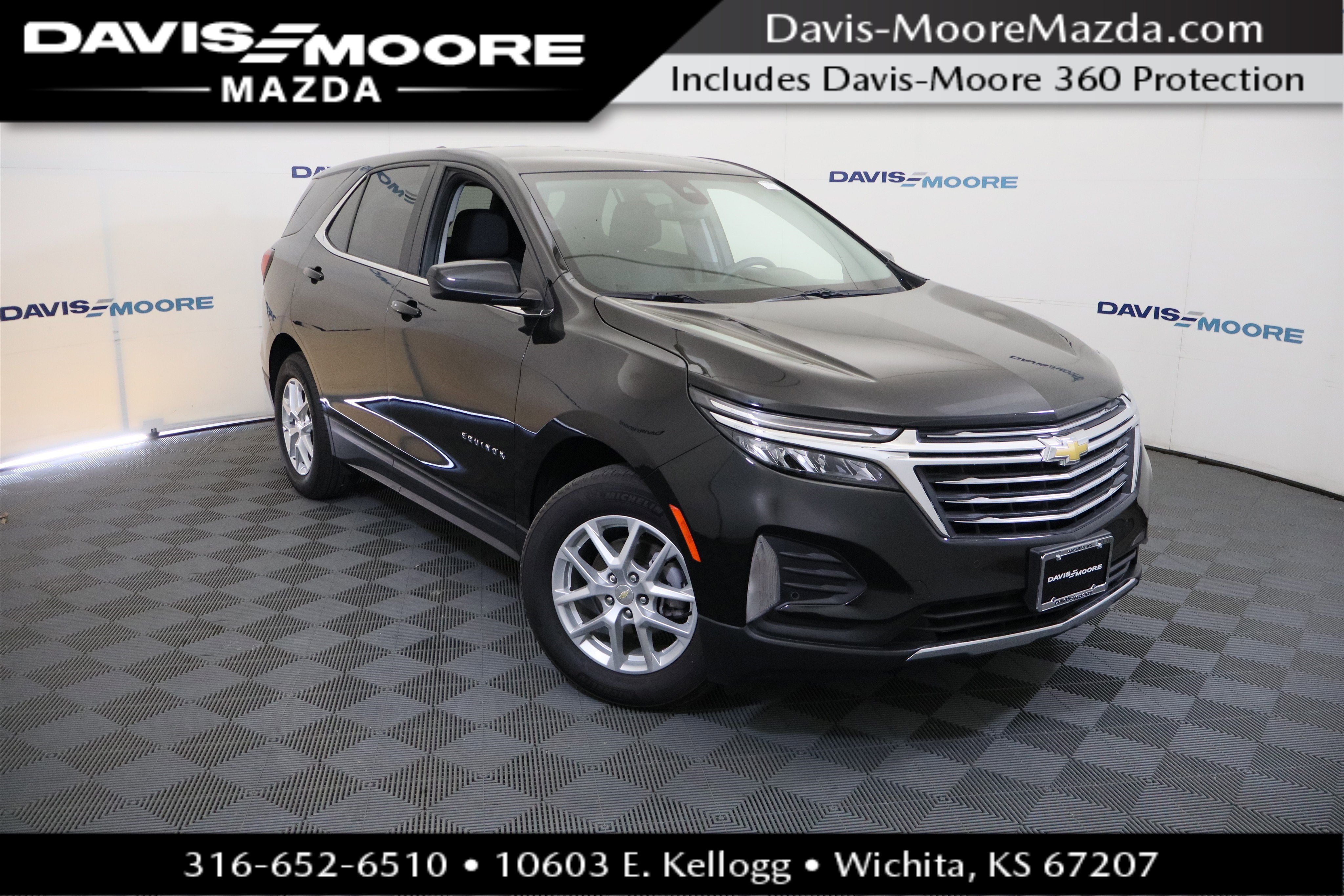 2024 Chevrolet Equinox LT in Mosaic Black Metallic — front three-quarter view