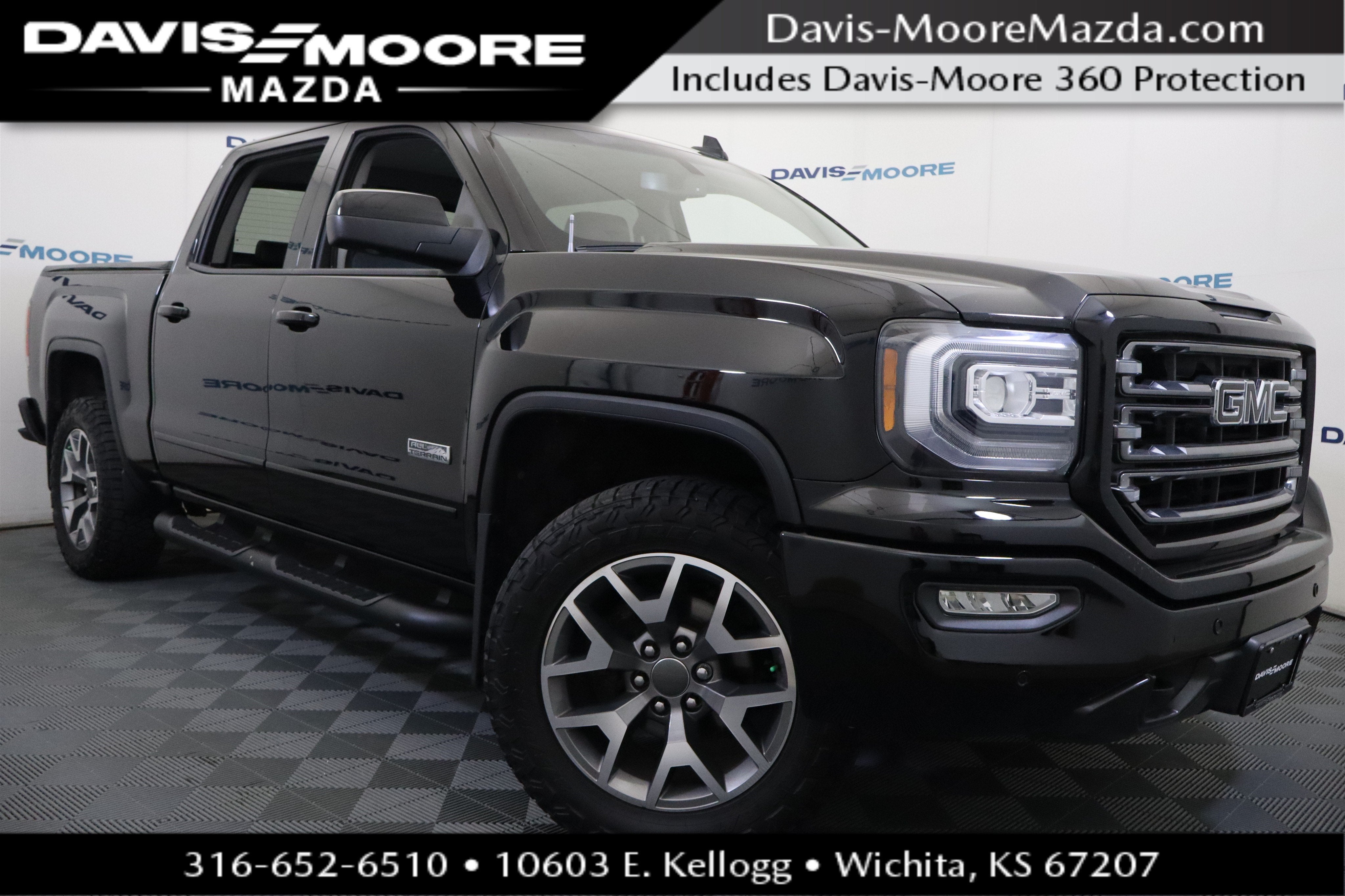 2018 GMC Sierra 1500 SLT in Onyx Black — front three-quarter view