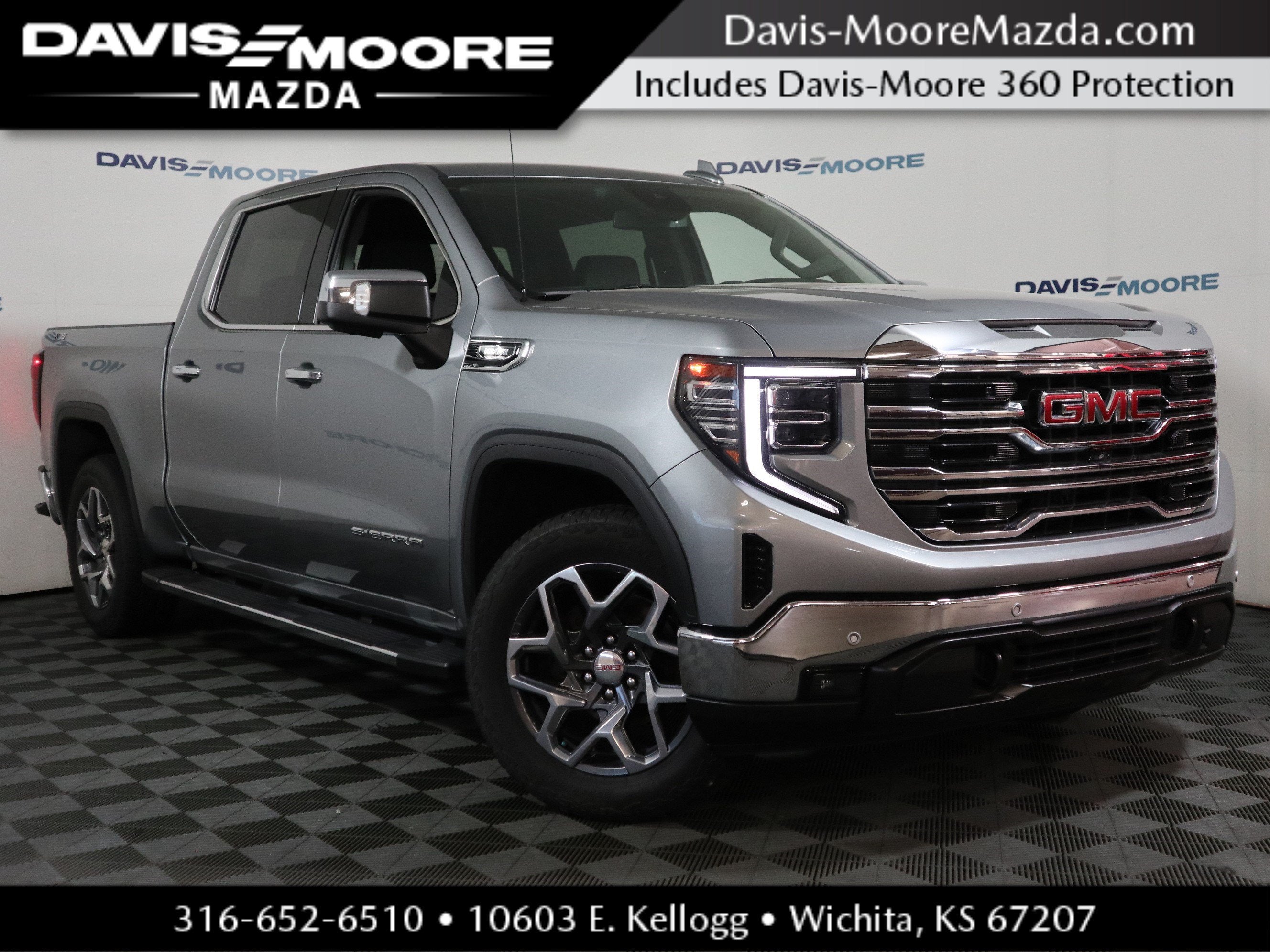 2023 GMC Sierra 1500 SLT in Sterling Metallic — front three-quarter view