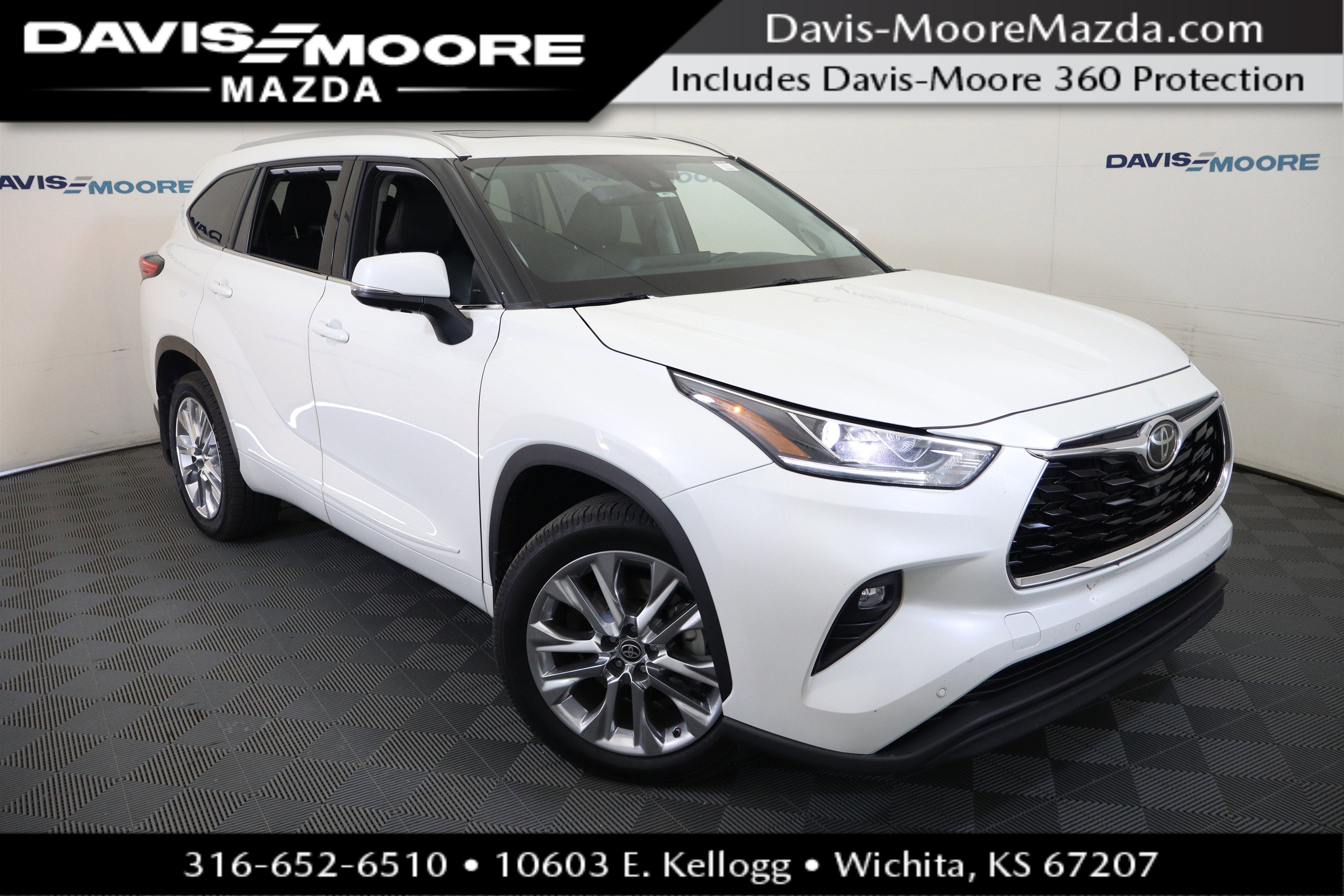 2021 Toyota Highlander Limited in Blizzard Pearl — front three-quarter view