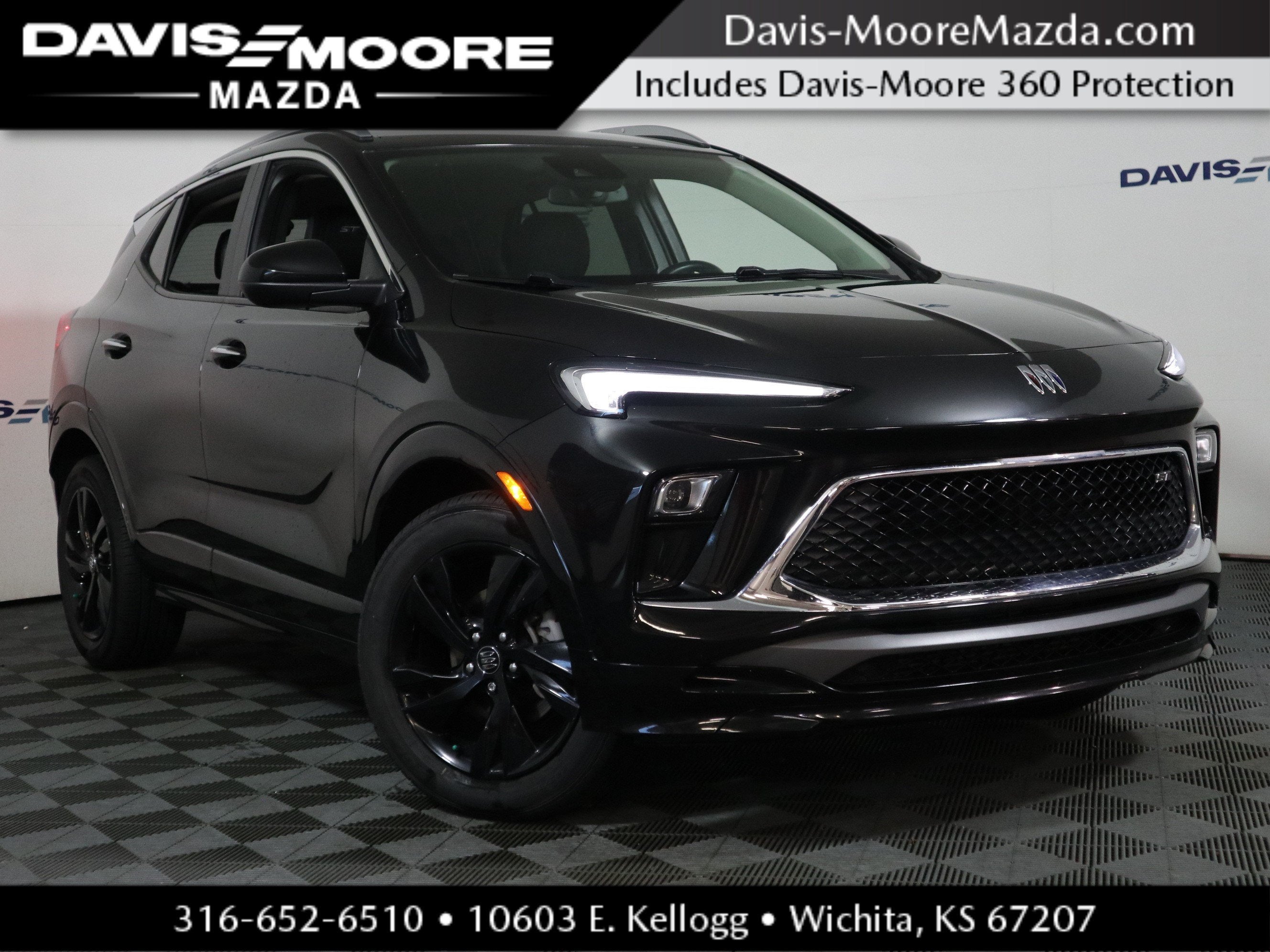 2024 Buick Encore GX Sport Touring in Ebony Twilight Metallic — front three-quarter view