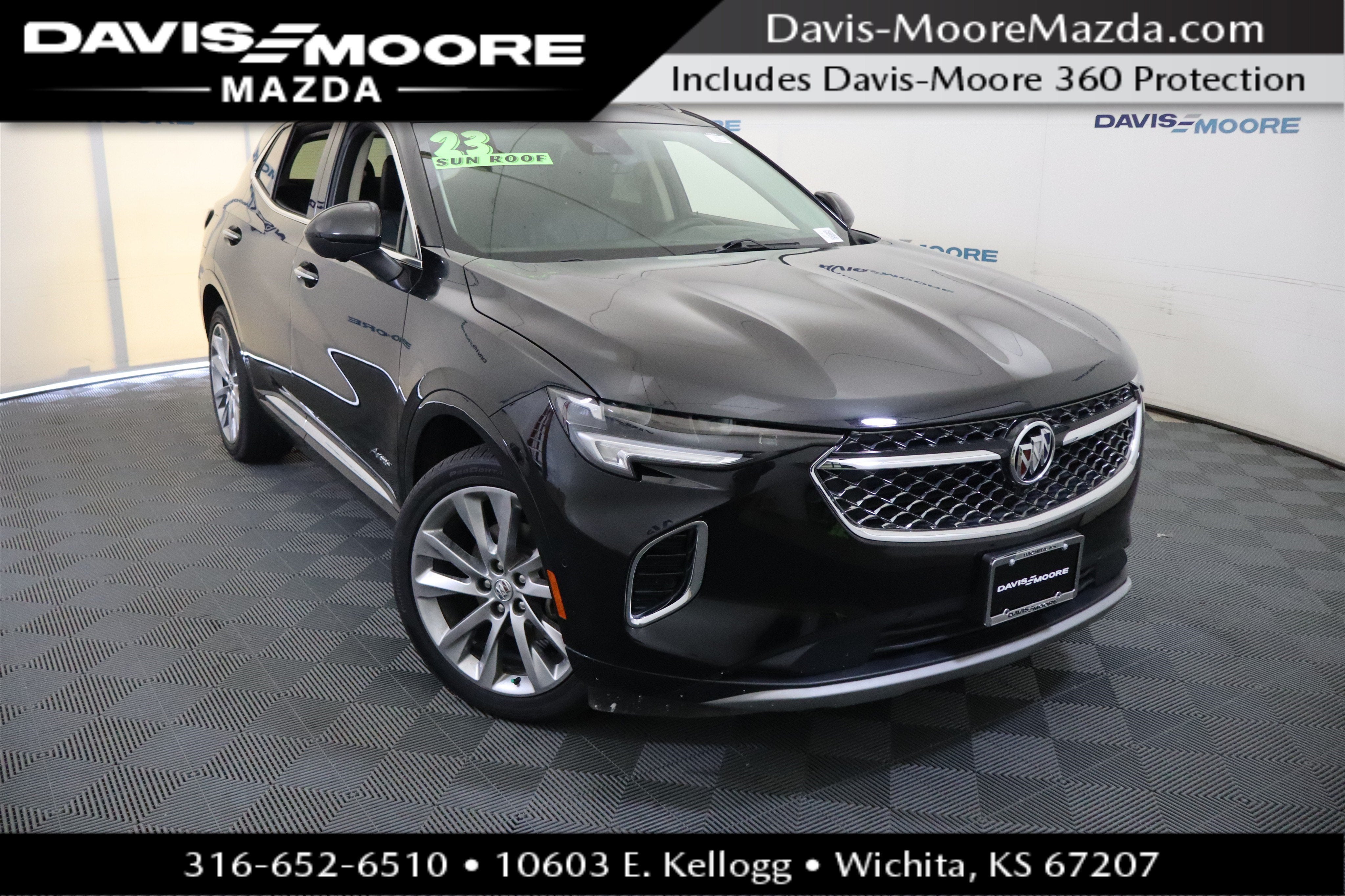 2023 Buick Envision Avenir in Ebony Twilight Metallic — front three-quarter view